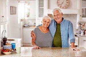 Older couple with arm around each other